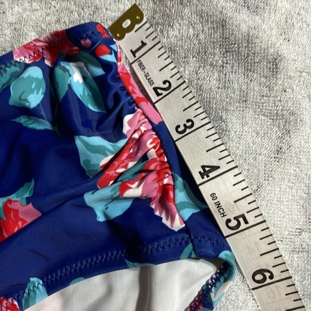 NWOT women’s blue floral swim bottoms M